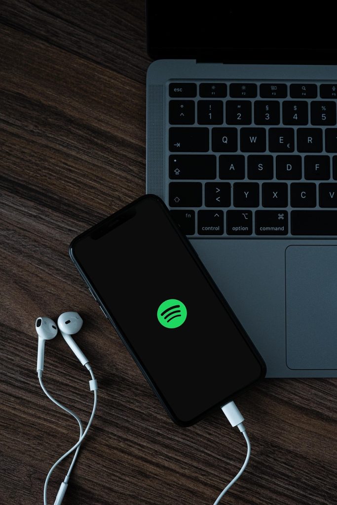 mobile phone, headphones, spotify, smartphone, cellphone, music service, music, social media, entertainment, podcast, laptop, macbook, technology, spotify, spotify, spotify, spotify, spotify